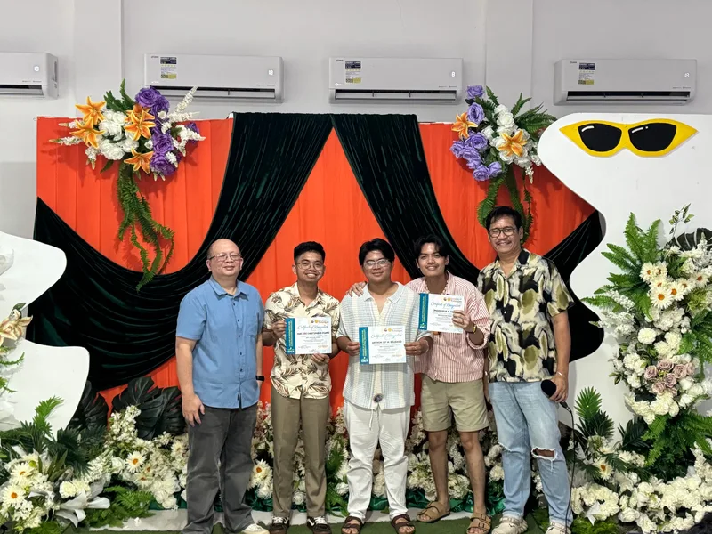 Team on the awards stage — Auxiliare capstone project